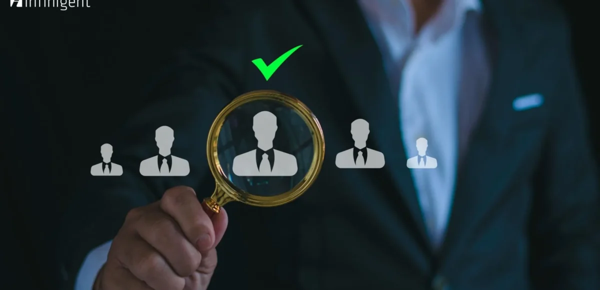 Business professional analysing employee profiles with a magnifying glass, representing data-driven evaluations and high-performance team building.